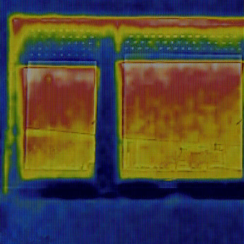 Thermal Image of Heat Loss Through Window.